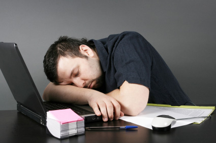 man-sleeping-at-desk