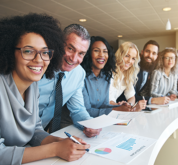 group of people working and smiling